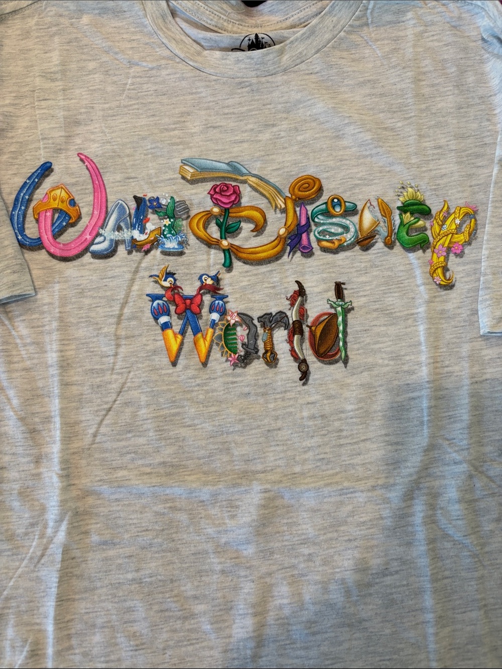 Disney NWOT  Gray Short Sleeve Tee with Multicolor Fantasy Lettering